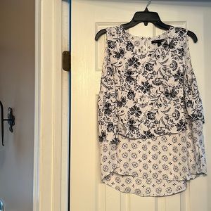 Super comfortable yet dressy polyester layered top.  Worn once.